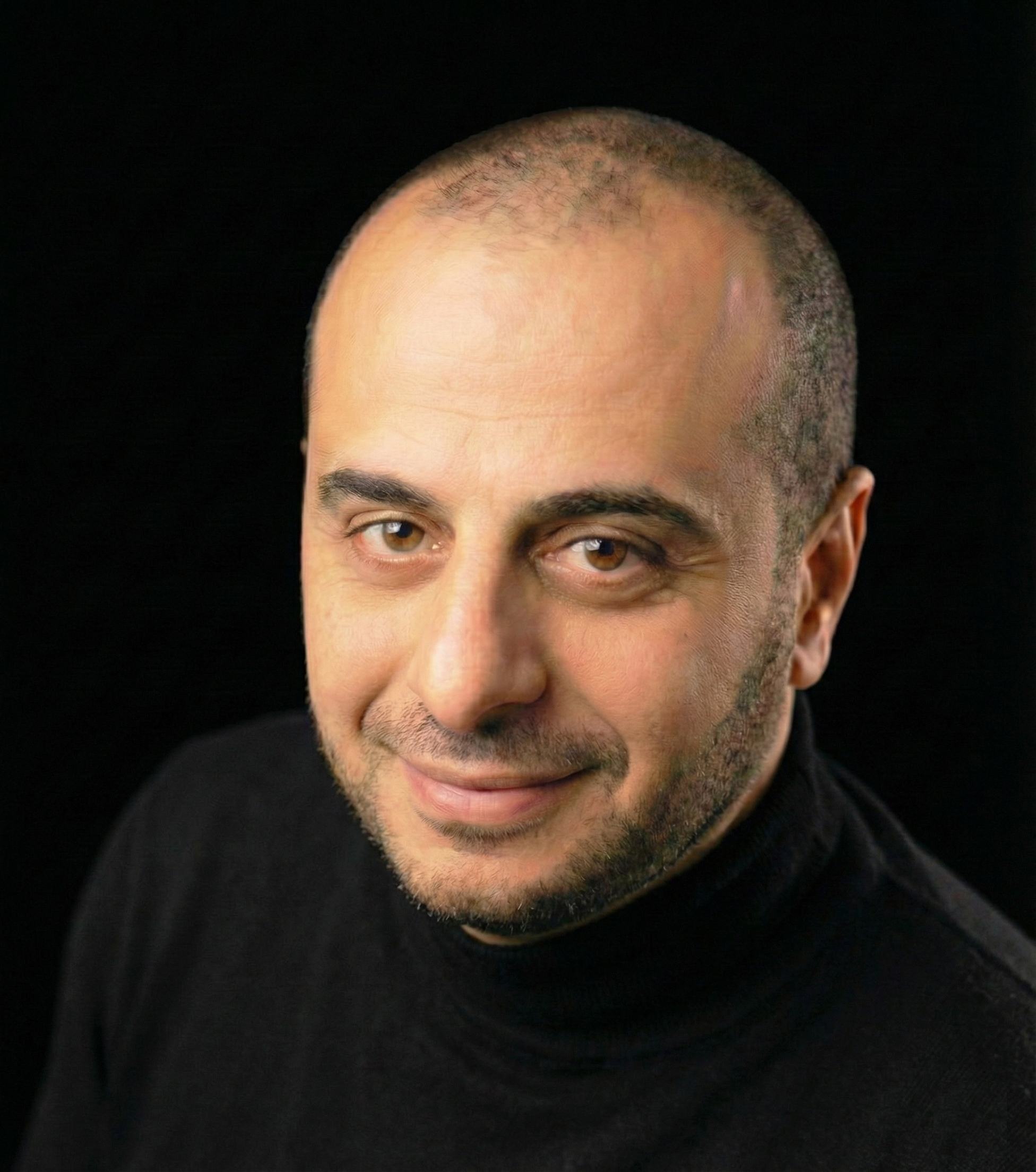 Professional headshot of Khaled Kalaldeh, The Vibe Inventor, showcasing modern Renaissance innovator aesthetic